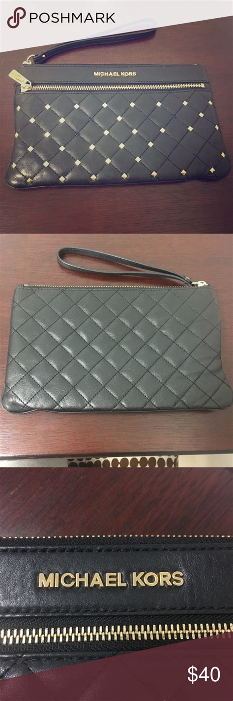 michael kors studded wristlet.